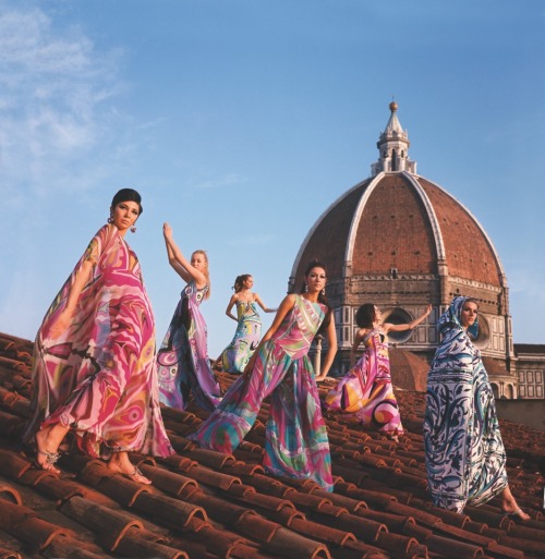 Models on the roof of Palazzo Pucci in Florence, wearing evening dresses, palazzo pyjamas and terryc