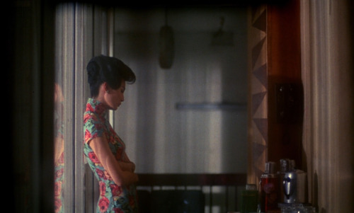 ‘花樣年華’ (In the Mood for Love), Wong Kar-wai (2000)It is a restless moment. She has kept her he