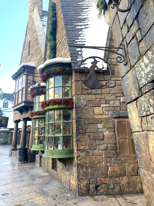 Wrought Iron sign for the public loo on the the High Street of Hogsmeade village, next to Dogweed &a