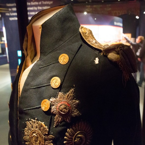 Epaulet on Admiral Nelson&rsquo;s coat and the bullet hole that killed him during the battle of Traf