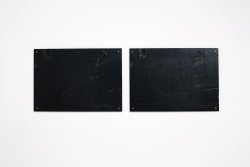 ocn:  Ryan Gander REMORSE IN BLACK AND BLACK, 2012 Each board: 84,1 x 59,4 x 1,8 cm, 7,5 cm between boards 