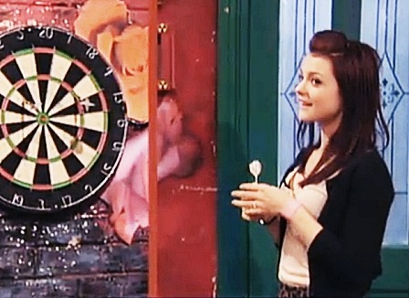 veruneedy:  Kathryn Prescott playing darts. 