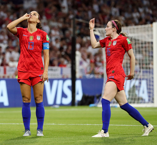 Alex Morgan celebrates her goal with Rose Lavelle during the match vs. England