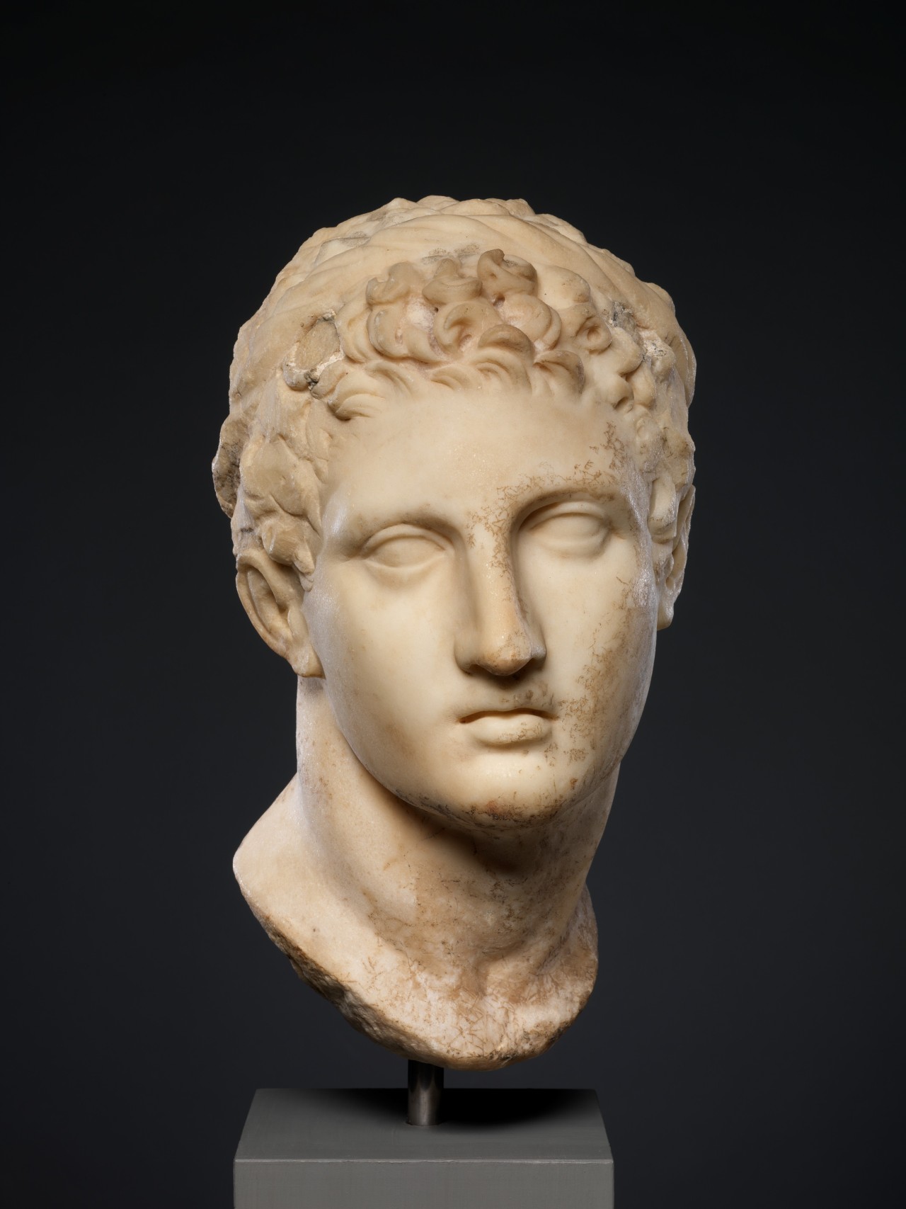 classical-beauty-of-the-past:  Marble head of a horned youth wearing a diadem  The