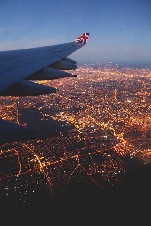 British Airways flight over city lights