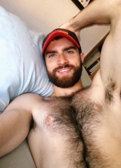 manlybush:  Just love this guy. So handsome. That thick furry trail leading down the centre of his chest makes me wonder how hairy his bush is 