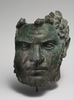 ancientpeoples:  Fragmentary bronze portrait of the emperor Caracalla Roman, ca. A.D. 212–217 (Mid-Imperial, Severan) Height 8 ½ in. (21.6 cm) This portrait depicts Caracalla as a grown man, when he was sole  emperor. He succeeded his father, Septimius