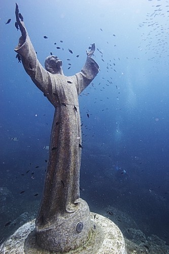 Blessings of peace (Christ of the Abyss, a bronze statue 17m underwater on the