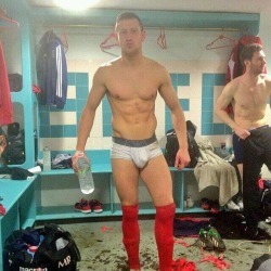 Men in rugby and footy socks