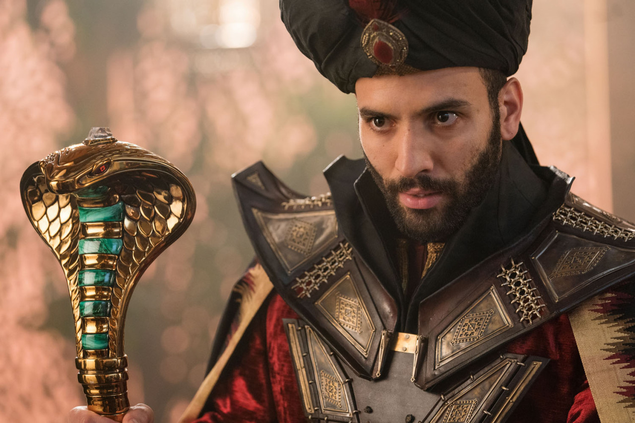 Why is Jafar seen as very tall in the Disney movie Aladdin but