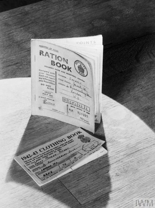 A ration book and clothing coupon book for British civilians during WW2.  Clothes rationing was anno