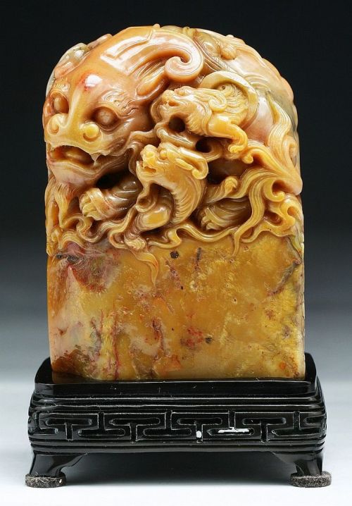 A Fine Chinese Antique Shoushan Soapstone Seal: presented on a wood standDimensions: H: 3-&frac1