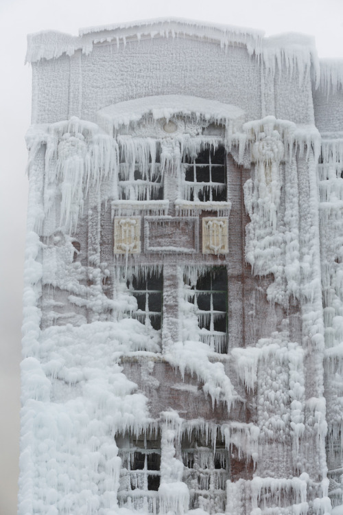 devidsketchbook:  FIRE AND ICE Chicago-based Photographer David Schalliol The Frozen Aftermath of a Chicago Warehouse Fire. Temperatures were so low during the fire that water sprayed on the building froze almost instantly leaving behind a spectacularly