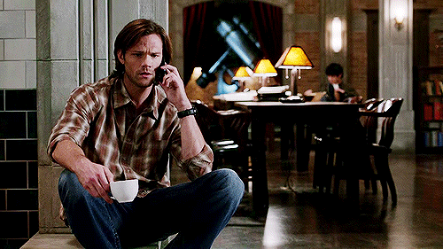 Sam casually sprawling on furniture. 