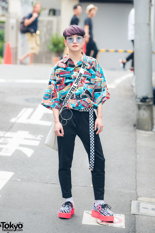 tokyo-fashion:19-year-old Taishin on the street in Harajuku wearing a print shirt with checkerboard belt, skinny pants, neon zebra creepers, and MTV tote bag. Full Look