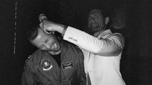 Glen Powell flight suit party