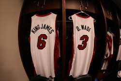 nba:  LeBron James and Dwyane Wade of the Miami Heat jerseys hang in their locker prior to a game at the Barclays Center on January 10, 2014 in the Brooklyn borough of New York City.   (Photo by Nathaniel S. Butler/NBAE via Getty Images) 