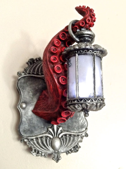 apolonisaphrodisia:   Sculpted tentacle holding an ornate Victorian lantern mounted on a resin plaque by   Dellamorte & Co.   Tentacles Group  