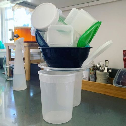 When you empty the #dishwasher and the plastic isn’t all dry yet. #stackCity #tupperwareTower https: