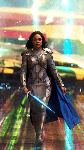 thorodinson:“Val emerges from the ship in full battle mode. Behind her, the Commodore FIREWORKS provide a spectacular HERO BACKDROP. She draws DRAGONFANG and smiles as Butchers begin swarming towards her. She is where she needs to be.” — Thor: Ragnarok