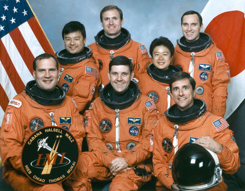 Crew of STS-65, including Chiaki Mukai (middle row, right), the first Japanese woman in space, and t