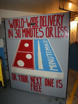 At a launch site in South Dakota, the entrance to the underground missile launch control center is sealed by a blast-proof door painted like a Domino&rsquo;s Pizza logo, and hand-lettered text on the door reads &ldquo;World-wide delivery in 30 minutes