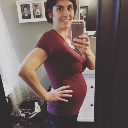 Sexy mommy with an amazing baby bump