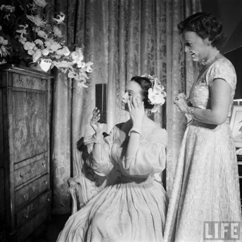 Gloria Vanderbilt sitting for wedding photos(Gordon Parks. 1955?)