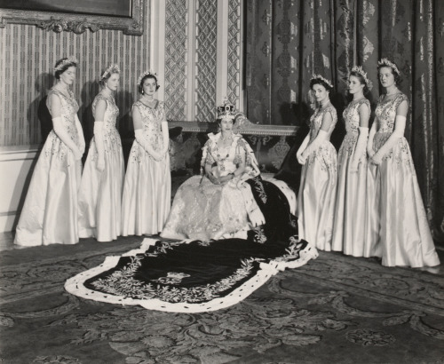 fripperiesandfobs: Dress designed by Norman Hartnell, worn by the Maids of Honor at the coronation o