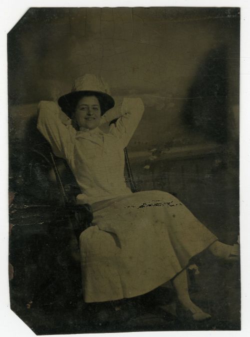 ca. 1880-1900s, [tintype portrait of a relaxed and smiling young lady]via Jeffrey Kraus Antique Phot