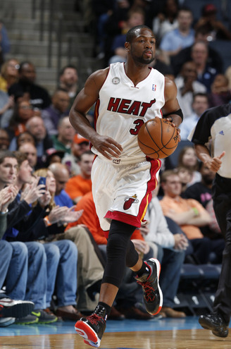 XXX fyeahbballplayers:  Dwyane Wade x the Bobcats; photo