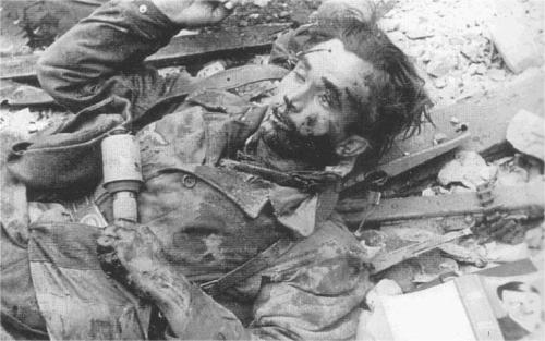 what-a-wonderful-war:Dead nazi solider of Luftwaffe. On the right corner of the picture, you can see