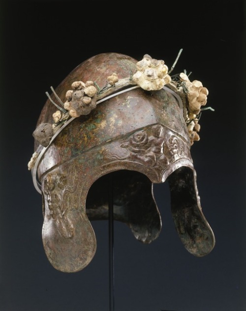 archaicwonder:Greek Bronze Chalcidian Helmet, 4th Century BC Adorned with relief ornament illustra