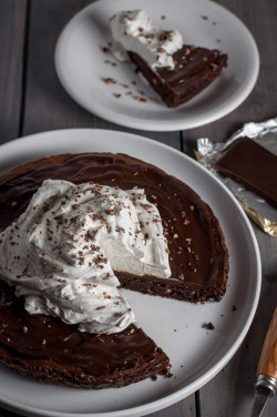 fullcravings:  Flourless Brownie Tart with Dark Chocolate Glaze and Whipped Coconut Cream