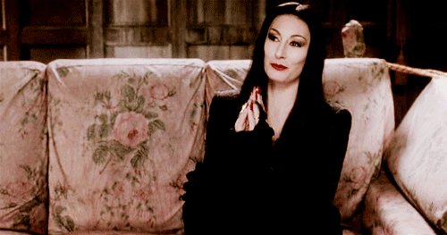 the-glamour-ghoul:  Oh Tish… Hero, icon, glamour ghoul. Carolyn Jones, Anjelica