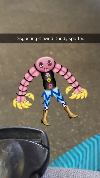 creepsandcrawlers:I get very bored on public transportation and snapchat emoji mosaic is actually a 