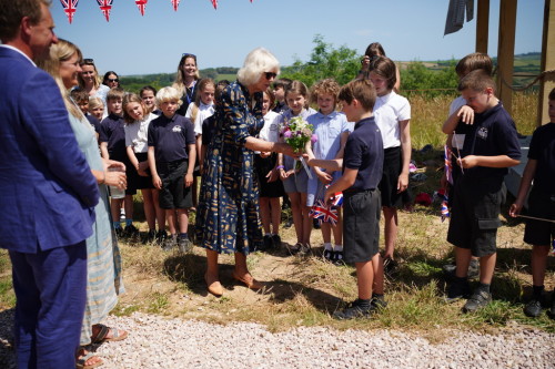 The Duchess of Cornwall visits Weaver Green at Heron Valley Orchards to learn how the company create