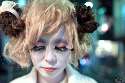 Memetan and C on the street in Harajuku at night. Memetan is wearing a handmade cyber wig with a fau