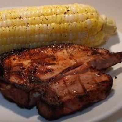 Pork chops are given a smoky, spicy rub, then grilled to tenderness for a main dish in under 1 hour.