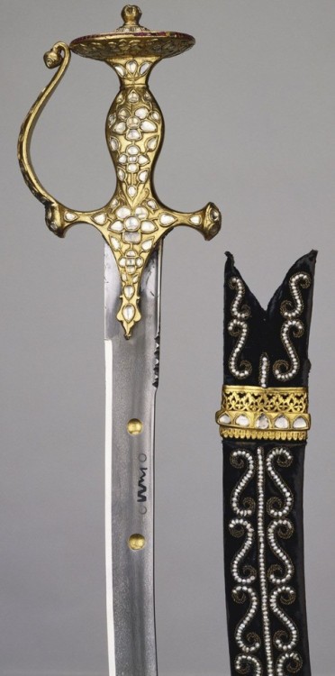 armthearmour: A Tulwar with a gilt and silvered hilt studded with diamonds, rubies, and pearls, pres