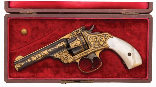Gold damascened Spanish copy of a Smith & Wesson with pearl grips, late 19th or early 20th centu