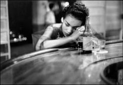 Eve ArnoldCUBA. Havana. Bar girl in the red