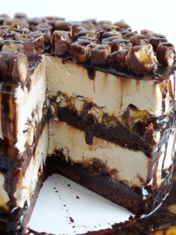 fullcravings:  Snickers Peanut Butter Brownie Ice Cream Cake 