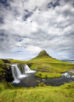 icelandicphoto:  Mt Kirkjufell (Church mountain) is a beautifully shaped and a symmetric, free standing mountain on the northern coastline of the Snaefell’s Peninsula W-Iceland. The creation of the mountain can be traced to the latest cold epoch of