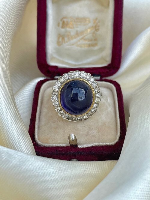 allaboutrings: Vintage 18k Gold Sapphire Cabochon and Diamond Halo Ring