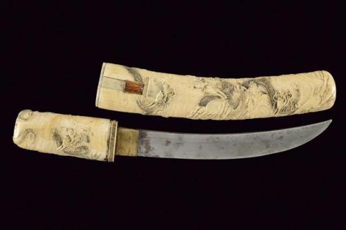 Ornate carved ivory Japanese tanto, 19th century.from Czerny’s International Auction House