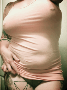 waytoomuchinformation:  I’ve been in nothing but this peach colored tank top since