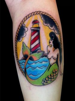 reddlr-tattoos:  My new Mermaid and lighthouse calf tattoo, done by Thaís Leite, Calavera Tattoo [Curitiba, Brazil] 