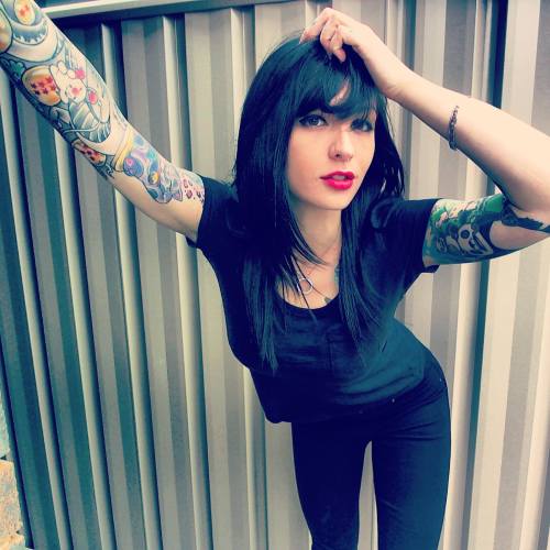 midnightbluesky:   My favorite tattooed girl & my favorite photo of her. AAHH! <3 <3 <3 