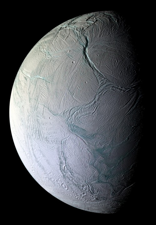This Is A Photo Of Saturn’s Moon Enceladus - A Dynamic Ice World.  Its Surface Shifts On Geologic
